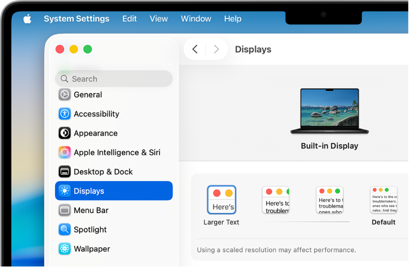 Fereastra Configurări sistem este deschisă pe desktop. Afișajul utilizează o rezoluție mai mică pentru ca elementele interfeței cu utilizatorul să apară mai mari.