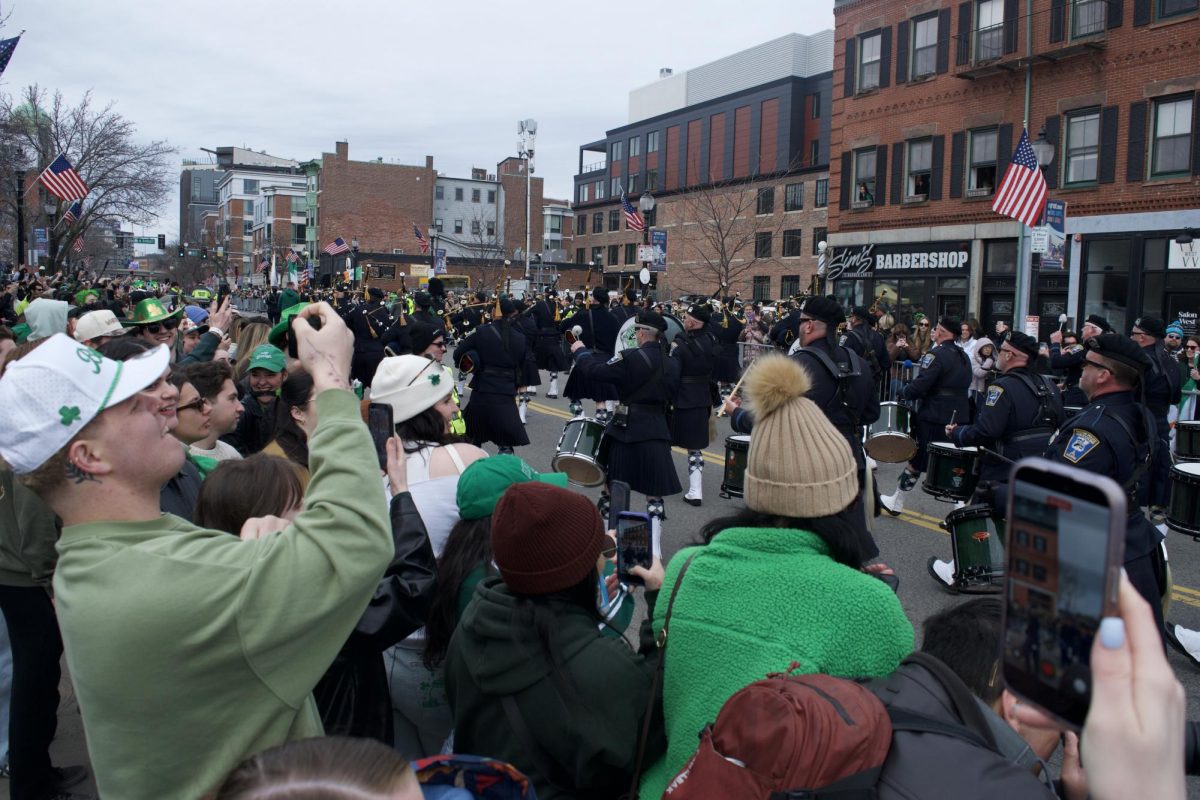 Bostonians and tourists alike cheer and applaud the passing annual St. Patrick’s Day parade March 15. Boston was the first city to celebrate St. Patrick’s Day in 1737.