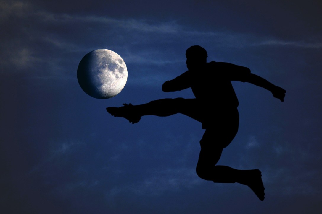 Offside Rule Python Quiz: silhouette of player kicking the moon