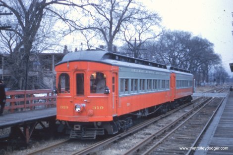 On December 7, 1958, CA&E wood cars 319 and 320 operated the last passenger train on that venerable railroad as a charter. Here, we are at Fifth Avenue station looking east. After the CTA abandoned the Westchester branch, this station was repainted in CA&E colors, and the interurban took over all service here from 1951-57.