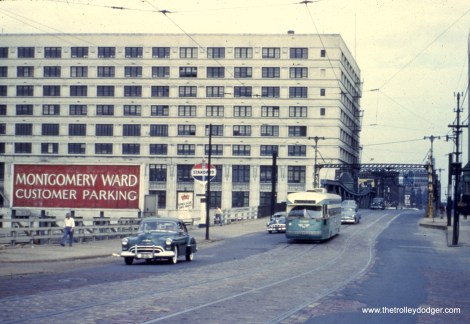 CTA 4168, on diversion trackage, heads west on Chicago Avenue, near the landmark Montgomery Wards Company Complex.