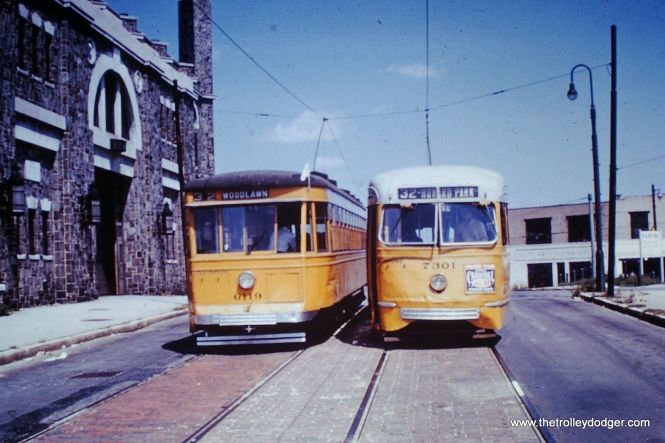 A modern Baltimore "Peter Witt" streetcar, built by Brill in 1930, alongside a PCC, made in 1936 by St. Louis Car Company.