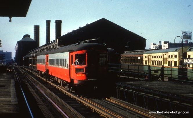#5 - EM: CAE 459 (St. Louis, 1945) at Racine Station. CRT cars, including 2880, also visible. BS: E/B train of St Louis cars passing the Met shop at Racine Ave. View looks west. AK: Throop shop – note that while shop had quite a bit of inside capacity, there was almost no outside storage.