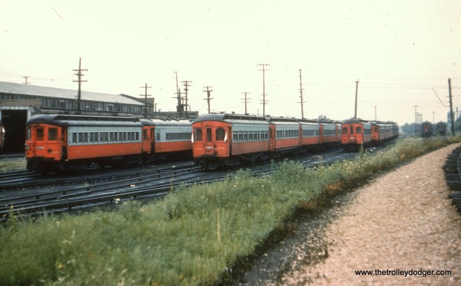 #10 - WS: Storage Yard at Wheaton Shops (shop building is at left). Photographer is looking W-S/W off Elgin Branch (which is visible at right).