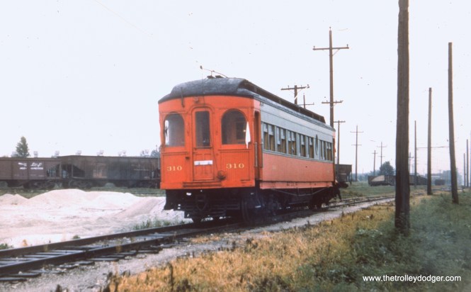 #34 - EM: CAE 310 (Hicks, 1907) southbound at the stone quary on the west side of Mannheim Road, probably the same fan trip as in picture #30. View is looking NW. AK: On Cook County Branch around Jackson or so, next to Mannheim Rd.
