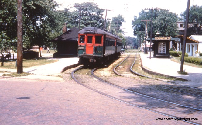 The view looking south towards the Wilmette station on the CNS&M Shore Line Route, which was abandoned in 1955. For a view from the other end of the same station, look here. Northbound trains began street running on Greenleaf Avenue here.