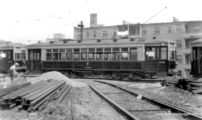George Trapp: "Car 3120 and others of it's class are actually in the Clark-Arthur loop, materials stockpiled for rebuilding of Devon Depot which was being rebuilt at the time." Half of Devon Station burned down in a 1922 fire. (Fred Borchert Photo, printed by Edward Frank, Jr.)