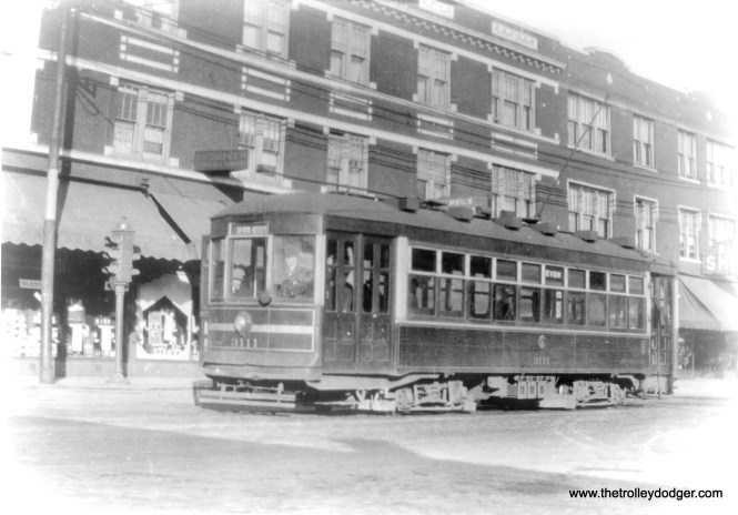 CSL 3111, signed for Devon and Kedzie. George Trapp: "Cars 3111 and 3118 are westbound and eastbound respectfully at Devon and Glenwood (1400 west ) sometime prior to July 10, 1932 when the Devon shuttle was replaced by the extension of the Broadway and Through Route 1 cars to Devon-Kedzie. Both are 45 class small safety cars."