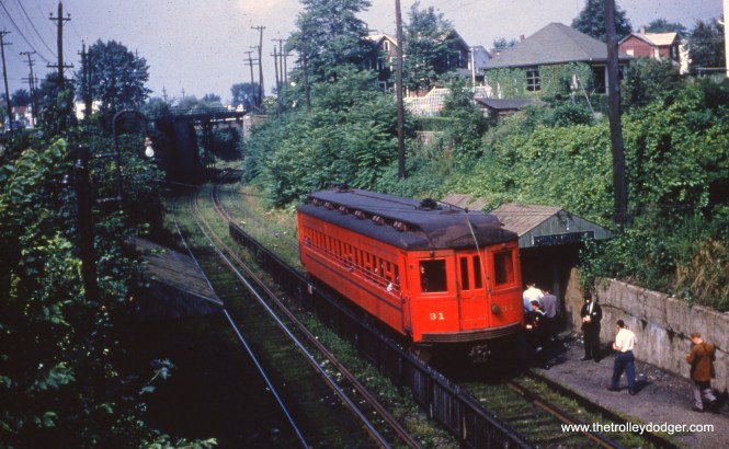 Here is Lackawana & Wyoming Valley 31 as it appeared on August 3, 1952. Passenger service ended on this third-rail line at the end of that year. Some have wondered if the LL rolling stock could have benefited the Chicago, Aurora & Elgin, but the general consensus is these cars would have been too long to navigate the tight curves on the Loop "L", although perhaps they could have been used west of Forest Park. As it was, there were no takers and all were scrapped. Ironically, some thought was later given by a museum of adapting a CA&E curved-side car into an ersatz Laurel Line replica, but this idea was dropped.