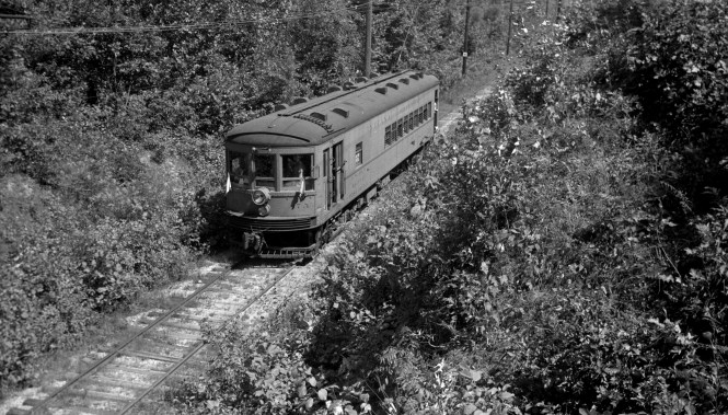 Indiana Railroad 375, probably on a 1938-40 fantrip. Don's Rail Photos: "375 was built by St Louis Car Co in 1926 as Indiana Service Corp 375. It was ass1gned to IRR as 375 in 1932 and rebuilt as a RPO-combine in 1935. It was sold to Chicago South Shore & South Bend in 1941 as 503 and used as a straight baggage car. It was rebuilt in 1952 with windows removed and doors changed."