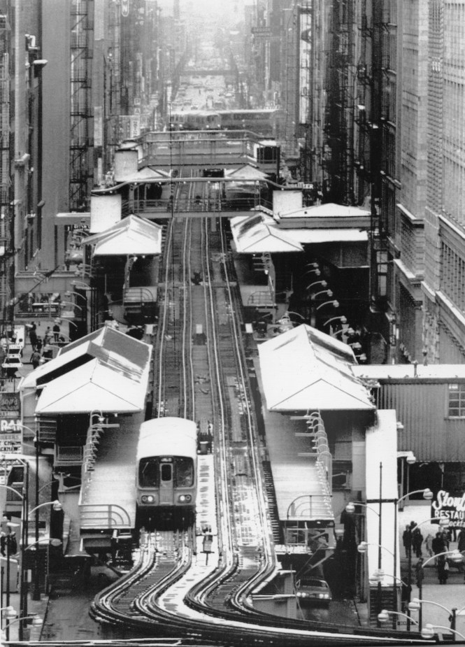 A dream that fortunately did not come true: CHICAGO'S LOOP ELEVATED TRACKS TO GO January 4, 1974 - This is a view looking south of the Elevated tracks of Chicago's CTA system on Wabash Avenue. This section along with other portions that formed "The Loop" is scheduled to be taken down sometime in the future with the building of a subway that is to take its place.