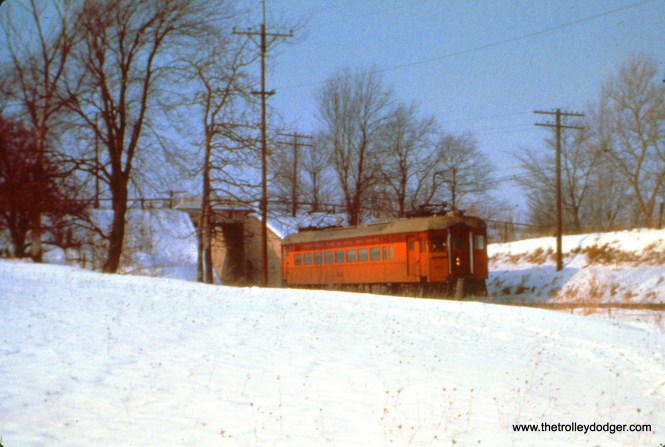 South Shore car 197 (train 15) has just gone through the underpass at Emery Road at Hicks, which had once been a flag stop, on December 26, 1963. (John D. Horachek Photo, William Shapotkin Collection)