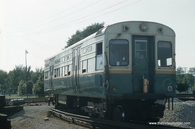 A two-car train of CTA 6000s on the turnaround loop in Forest Park, west end of the Congress-Milwaukee line. That loop-shaped thing on the front of the train was used for route selection, since these trains shared tracks with Douglas-Milwaukee trains further east of here.