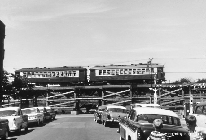 The Lake Street "L" ramp between Central Avenue and Laramie circa 1961-62. This was after the changeover point between third rail and overhead wire was moved west of here. I think this picture was taken looking north on Latrobe.