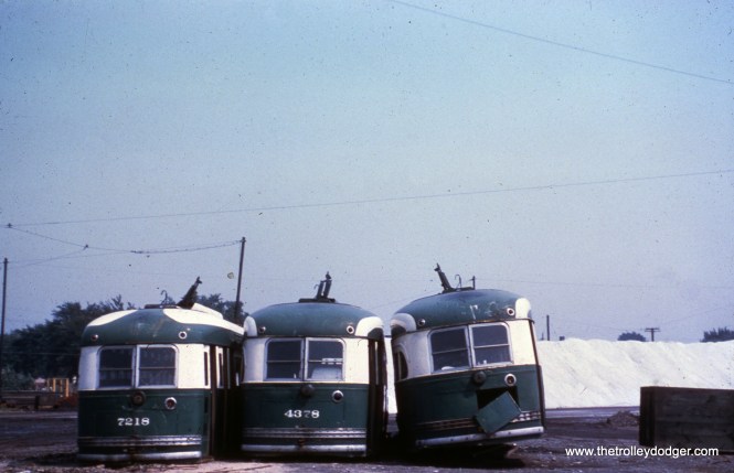 CTA 7218, 4378, and 4399 at South Shops in August 1959, more than a year after the last Chicago streetcar ran.