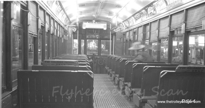 The interior of New Orleans Public Service 924 on April 19, 1958, as photographed by Bob Selle. Note the ugly signs, evidence of the racial segregation of the time.