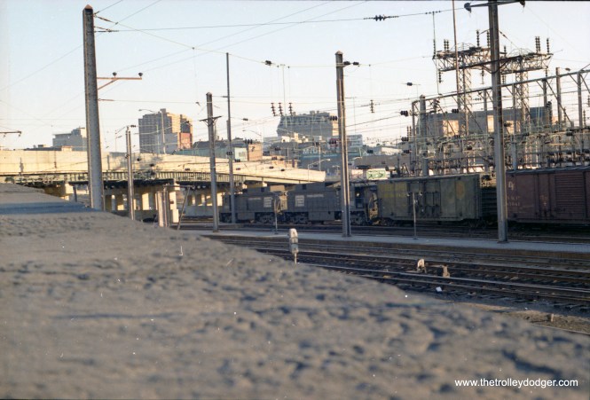 Conrail E33s (Ex-New Haven, exx-Virginian locomotives) passing around Pennsylvania Station