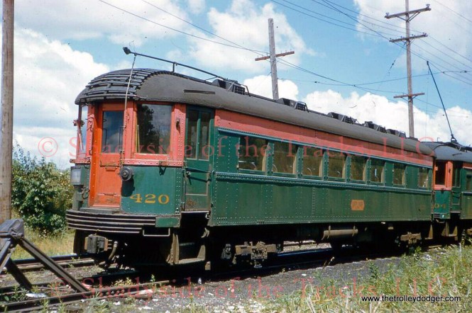 NSL 420 in Mundelein by Robert E. Bruneau, 8/20/61. Don's Rail Photos: "420 was was built by Pullman in 1928 as an observation. It was out of service by 1932. On July 21, 1943, it reentered service as a motorized coach. It was sold to Seashore Trolley Museum in 1963."