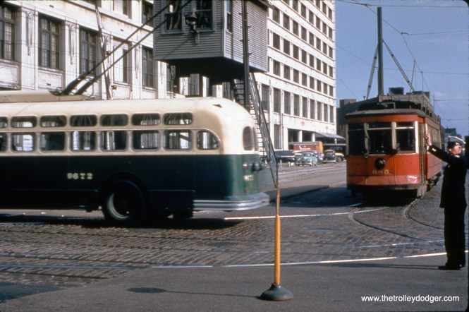 The view looking north along Larrabee Street at Chicago Avenue, by the Montgomery Wards complex. The tower is for switching Milwaukee Road freight trains. (William C. Hoffman Photo, William Shapotkin Collection)