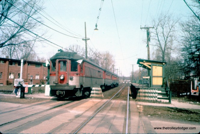On March 25, 1962, NSL cars 771, 415, 753, and 251 are on a Central Electric Railfans' Association fantrip at the Isabella station in Evanston, where no North Shore cars had been since the Shore Line Route was abandoned in 1955. (William C. Hoffman Photo, William Shapotkin Collection)