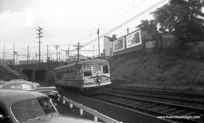 Shaker Heights Rapid Transit car 302, formerly of the Aurora, Elgin & Fox River Electric, is inbound at Woodhill Road on September 6, 1951. Don's Rail Photos: "302 was built by St Louis Car in 1924, #1308. In 1936 it was sold to CI/SHRT as 302 and in 1954 it was sold to Gerald Brookins for the Columbia Park & Southwestern aka Trolleyville." Sounds like it was scrapped there for parts.
