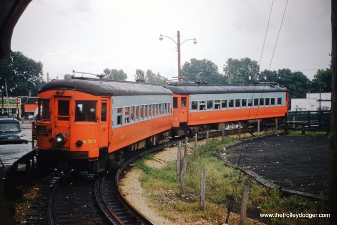Chicago Aurora and Elgin cars 455 ad 460 are looping at the DesPlaines Avenue Terminal in Forest Park on July 23, 1955. This view looks east.