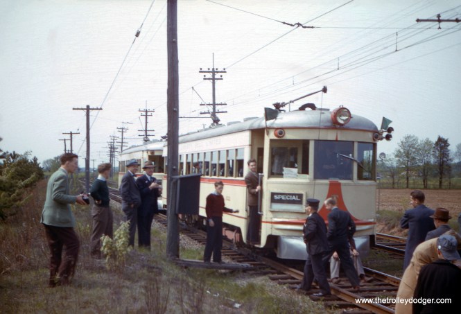 Now here's something you don't see every day... an honest to goodness 1939 Kodachrome slide. That makes this image about 85 years old. This must have been taken when Lehigh Valley Transit put these renovated lightweight high-speed cars into service. They were originally built for the Cincinnati and Lake Erie in 1931. That interurban went out of business in 1938, and LVT purchased several cars, which were freshened up with the help of J. G. Brill's art department. The Liberty Bell interurban ran between Philadelphia and Allentown, Pennsylvania. These cars replaced some much older ones and helped keep things going through the war years and up until the 1951 abandonment. There was a very active NRHS (National Railway Historical Society) chapter in the area, and this is probably a fantrip they sponsored. Looks like the lead car is 1002.