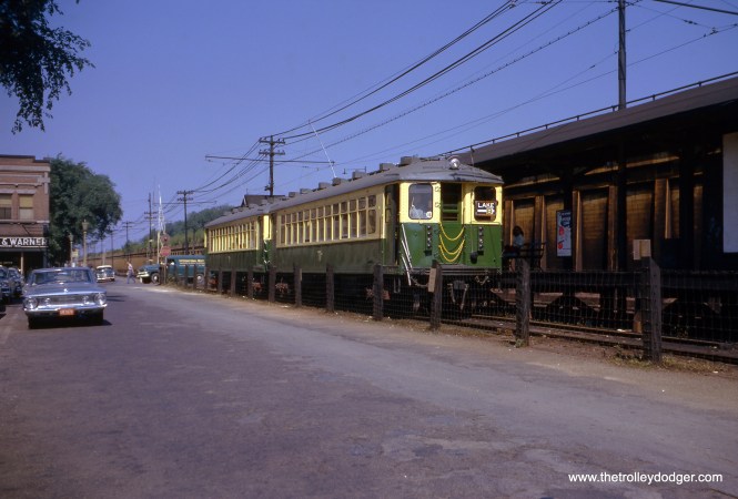 CTA #4436 fronts a two-car "B" train at the Oak Park Avenue station on the Lake Street "L" on June 20, 1962. Four months later, the "L" was elevated, and the street running between Forest Park and Laramie Avenue came to an end. Notice how South Boulevard narrows just west of here. (Jeffrey L. Wien Photo)