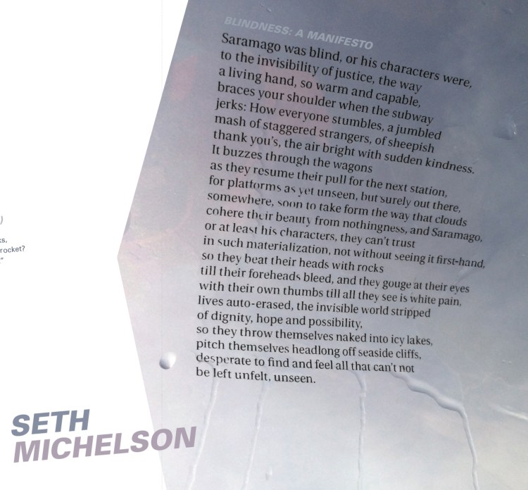 Close-up of typographic detail showing type interacting with droplets and streaks of water