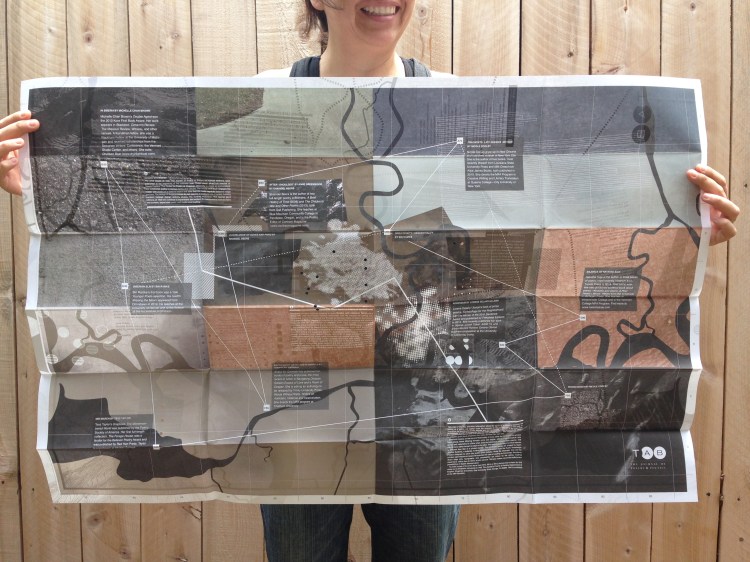 Holding a 24 x 36 map with biographies on top of full color abstract photography of texture of skin, concrete, asphalt, liquids, and a longitude/latitude grid.