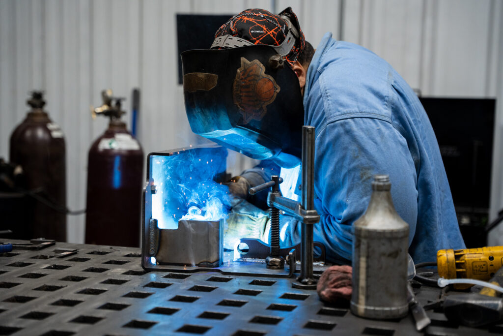 welding components together to make parts