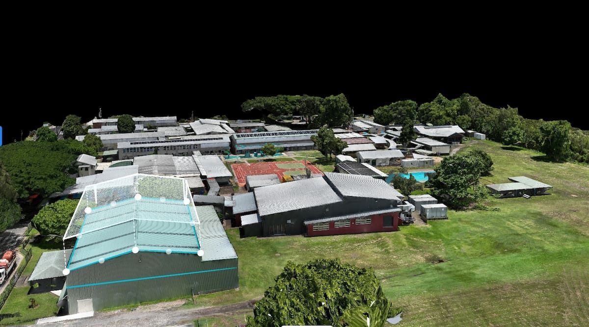 An Aerial 3D view of a School With a Lot of Buildings and Trees — Tailored Spatial Solutions in Cairns City, QLD