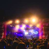 First-year students crowded in front of the MSU stage during the headphone disco.