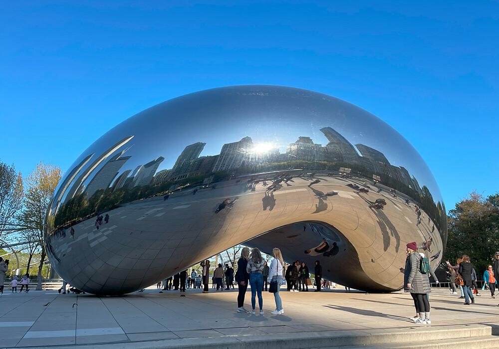 The Cloud Gate at Chicago reflecting the city's skyline.