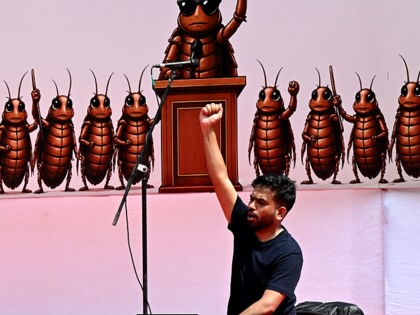 Cockroach Janata Party founder Abhijeet Dipke with his supporters during a protest seeking Union Education Minister Dharmendra Pradhan's resignation.