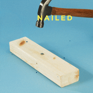 Hammer hammering a nail in wood. Caption: 'nailed it'