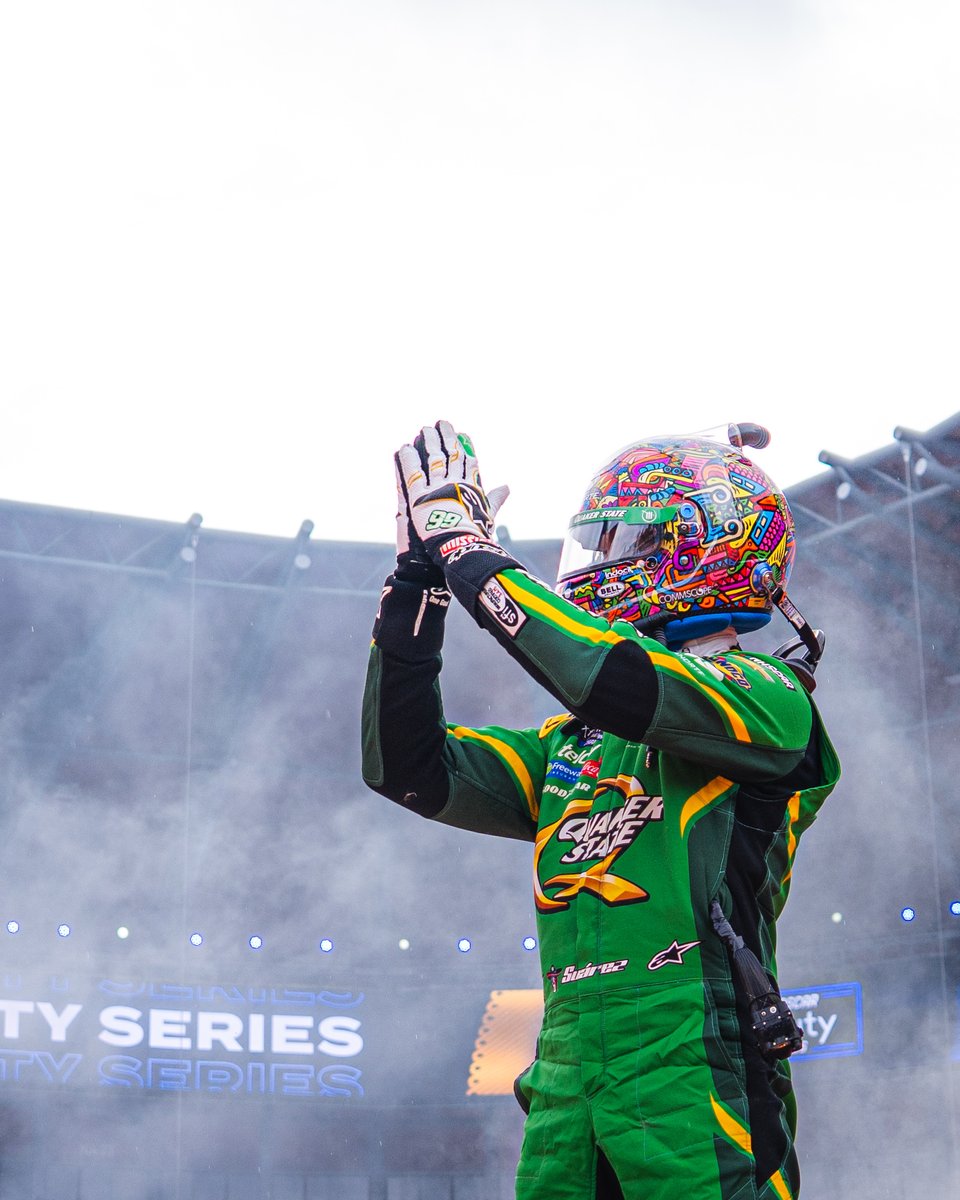 Daniel Suárez makes a gesture of gratitude toward the fans in Mexico.