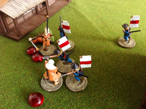 Two wounded monks are ganged up on