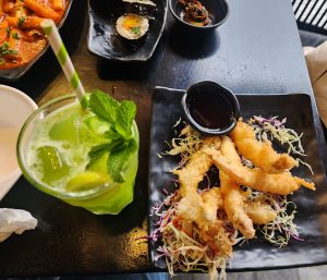 Korean Shrimp Food with mint soft drink and ice cube in it.