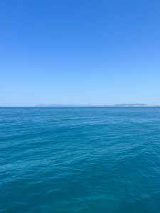 A view from the sea of the coast of Crete, Greece.