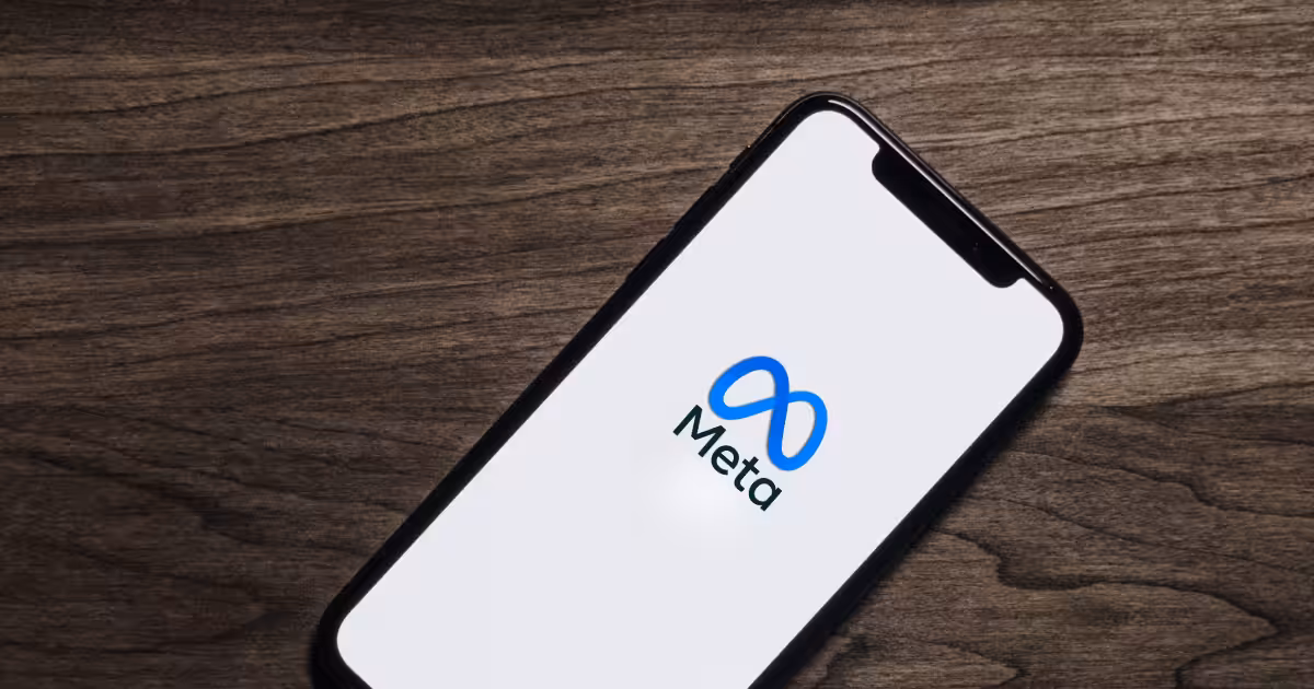 meta logo on phone screen