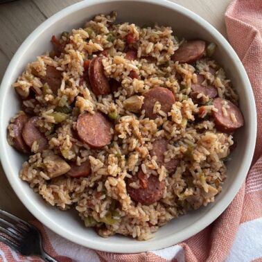A bowl of easy instant pot jambalaya loaded with andouille sausage.