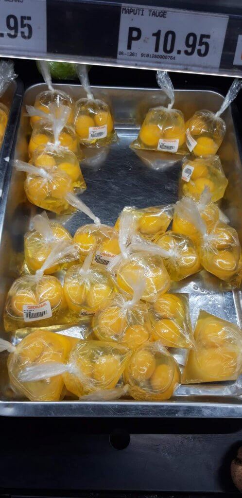 broken eggs in plastic bags