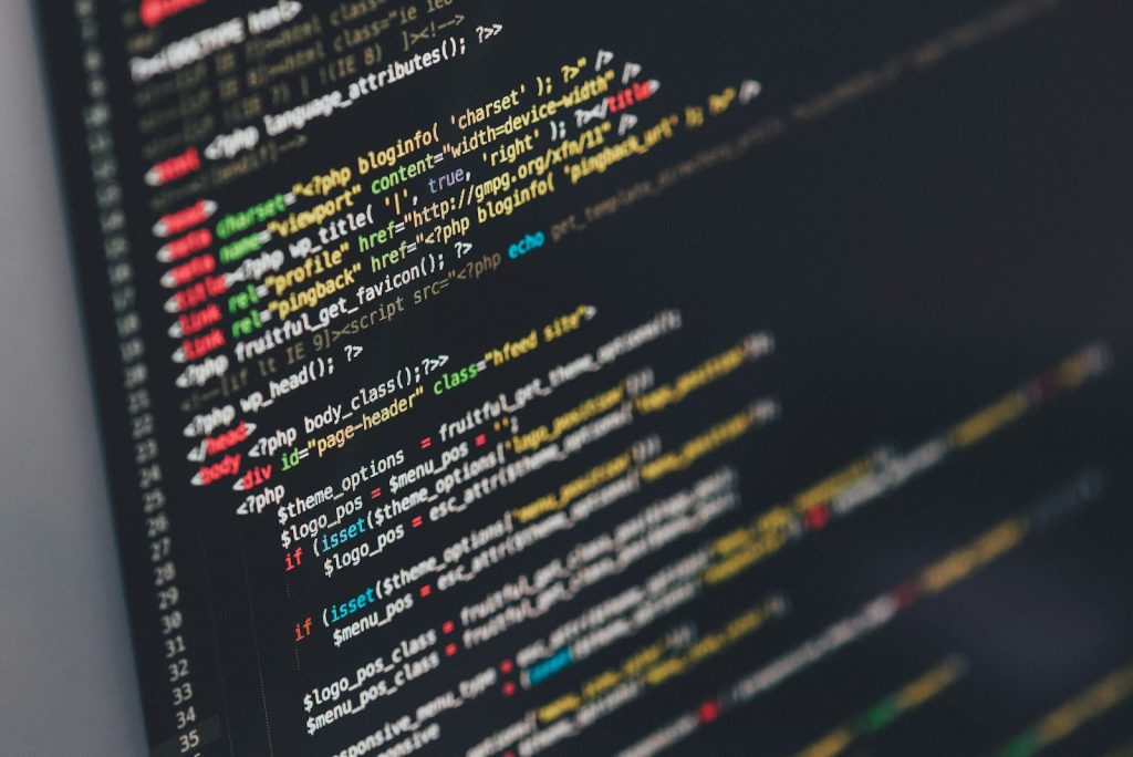 monitor showing html + php programming