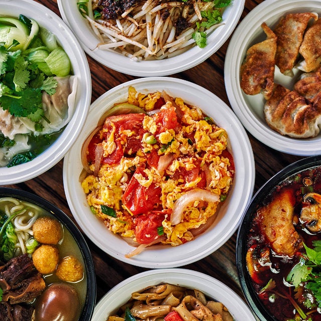 The menu centers on hand-folded dumplings and Sichuan-inflected noodle soups, but also veers into Thai and Korean dishes, and Chinese home-cooked staples like creamy scrambled eggs and tomatoes over rice.