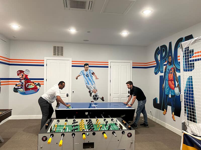 Air hockey competition with Mircea - Syed Balkhi Air hockey competition with Mircea