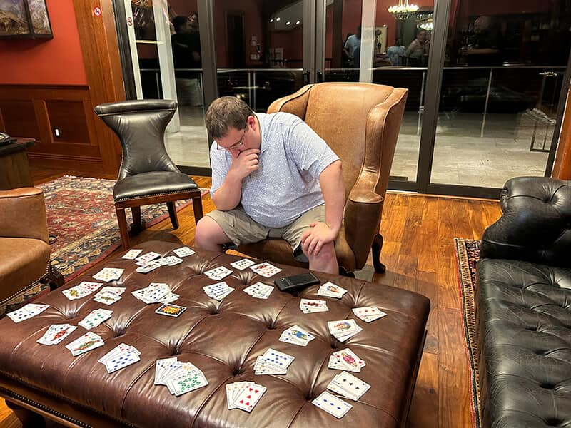 Christoff looking over the scores for Five Crowns lol - Syed Balkhi Christoff looking over the scores for Five Crowns lol