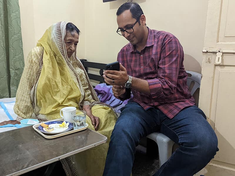 Hanging out with my grandma showing her photos from the year - Syed Balkhi Hanging out with my grandma showing her photos from the year