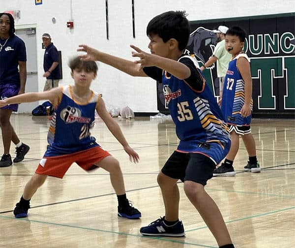 Solomon playing defense at his first basketball game - Syed Balkhi Solomon playing defense at his first basketball game