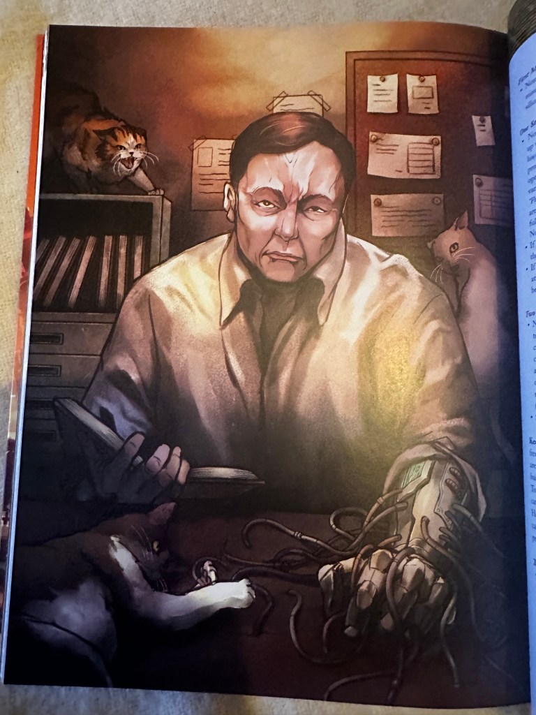 Nomura, the Fixer pictured with his cybernetic arms on the table in front of him. He is otherwise a normal enough looking Japanese man wearing a light coloured shirt. There are cats in both the foreground and the background.